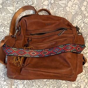 Brown Leather Backpack with Colorful Strap